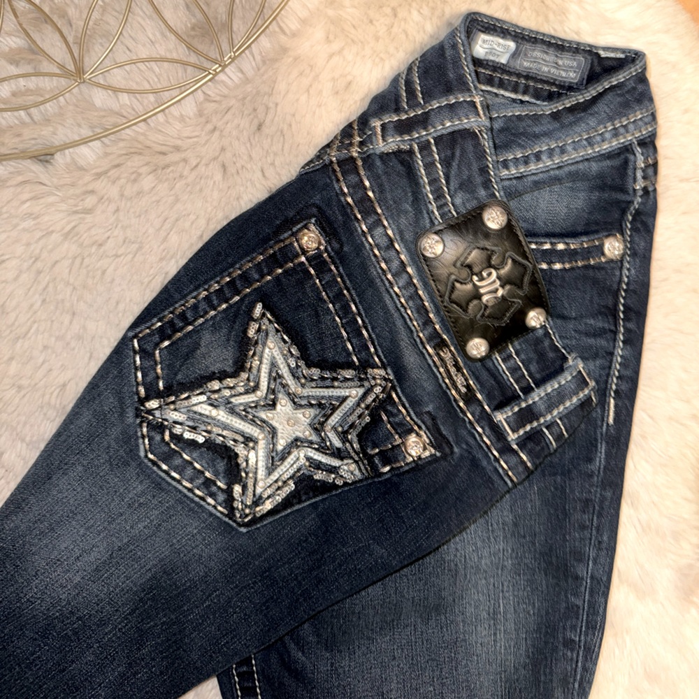 Dark low rise miss me jeans